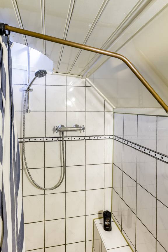 Tiled shower aboard the Spes Mea
