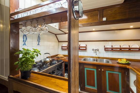 Worktop and cabinets in the galley of the Spes Mea