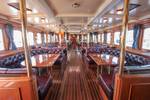 Saloon of the steamship Succes with tables and chairs