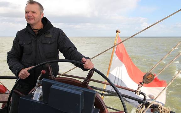 Man at the helm of the Sybaris