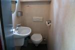 Toilet and washbasin in the bathroom of the Sybaris