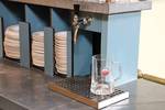 Beer tap and crockery in the galley of the Sybaris