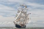 Three-masted Thalassa under sail, viewed from the bow