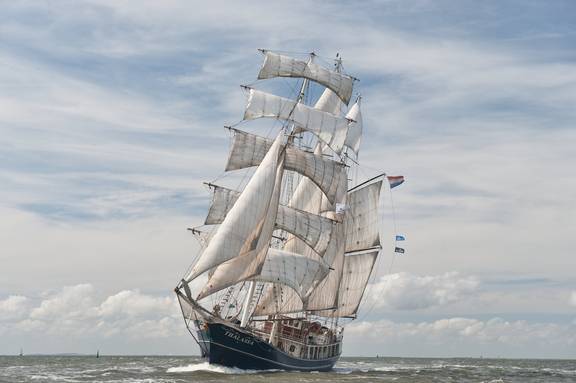 Three-masted Thalassa under sail, viewed from the bow