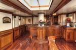 Wooden bar in the saloon of the Thalassa
