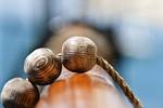 Wooden beads of the rigging around a spar on the Tsjerk Hiddes