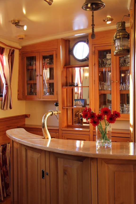 Wooden bar with a beer tap in the saloon of the Tsjerk Hiddes