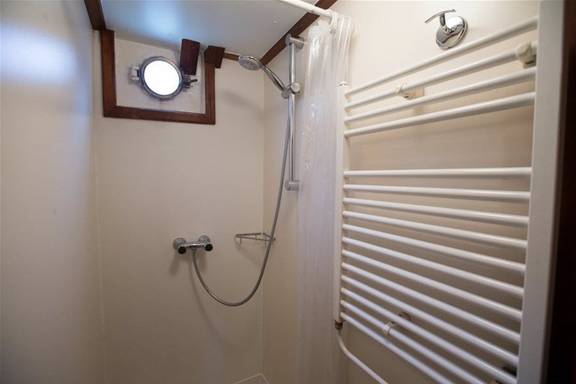 Shower with a heated towel rail on the Utopia