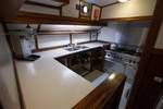 Galley of the Utopia with a gas cooker and double sink