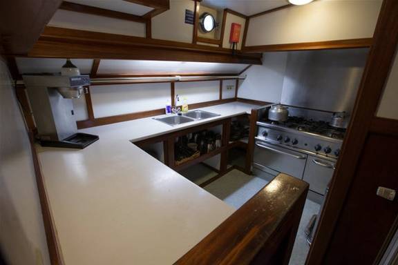 Galley of the Utopia with a gas cooker and double sink