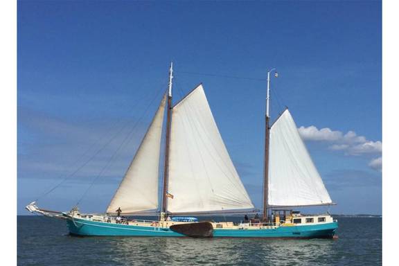 Utopia under sail, viewed from the side