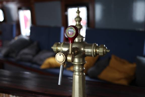 Beer tap in the saloon of the Vrijheid