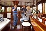 Guests at the wooden bar of 't Wapen fan Fryslân