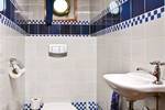 Tiled washroom with a washbasin on 't Wapen fan Fryslân