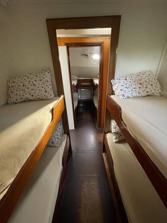 Cabin with bunk beds on both sides on the Waterman