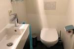 Bathroom of the Wilhelmina with a toilet and washbasin