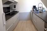 Modern kitchen of the Wilhelmina with grey worktops