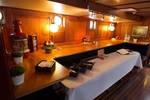 Buffet set up in the wood-panelled saloon of the Willem Barentsz