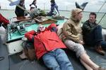 Guests relaxing on the deck of the Vrouwe Jitske
