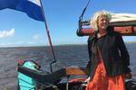 Skipper Cynthia Coolen at the helm of the Vrouwe Jitske