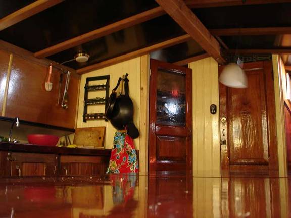 Wood-panelled interior with stairs in the saloon of the Vrouwe Jitske