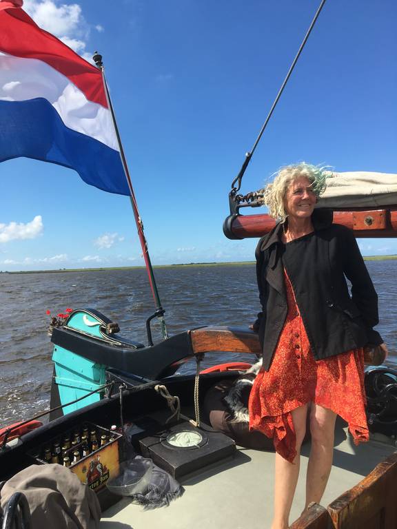 Skipper Cynthia Coolen at the helm of the Vrouwe Jitske