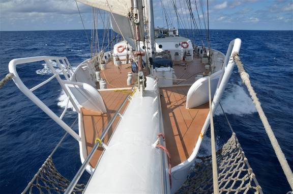 Foredeck of the Eendracht, viewed from the bowsprit at sea
