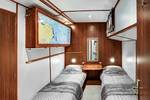 Twin-berth cabin with separate beds on the Mare fan Fryslân