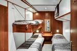 Three-berth cabin with two lower beds and an upper bunk on the Mare fan Fryslân