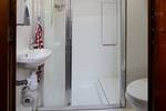 Washbasin, shower and toilet in the bathroom of the Orion